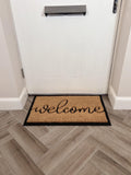 John Lewis natural coir door mat with welcome design, British brand