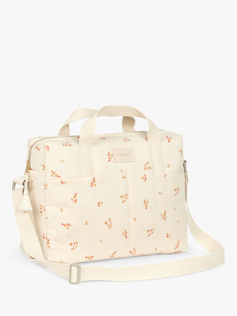Nobodinoz Gala changing bag yellow lily organic cotton, UK version