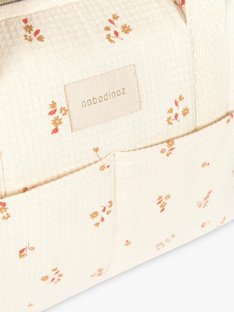 Nobodinoz Gala changing bag yellow lily organic cotton, UK version