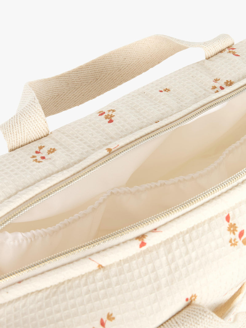 Nobodinoz Gala changing bag yellow lily organic cotton, UK version