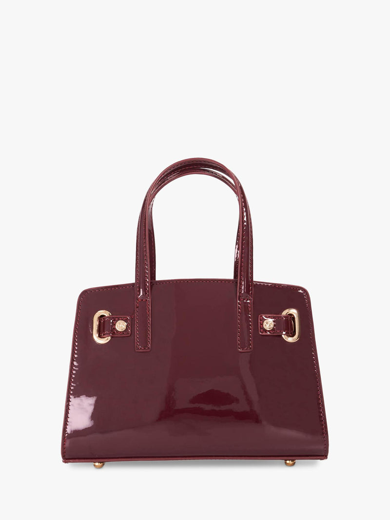 Dune London burgundy leather grab bag with belted detail, imported from the UK