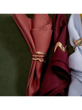 L'OBJET gold brass napkin rings with Swarovski crystals, UK version
