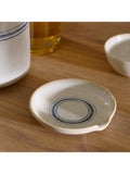 Neptune Melbury stoneware spoon rest in navy stripe (British brand)