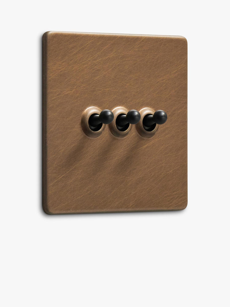 Dowsing & Reynolds antique brass triple toggle switch (British brand)