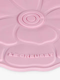 Le Creuset petal silicone trivet in pink, imported from the UK