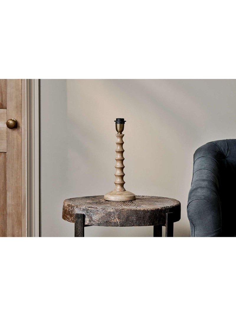nkuku Avisa mango wood spiral table lamp imported from the UK