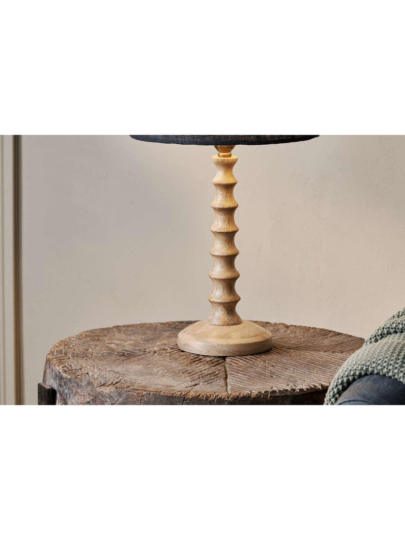 nkuku Avisa mango wood spiral table lamp imported from the UK