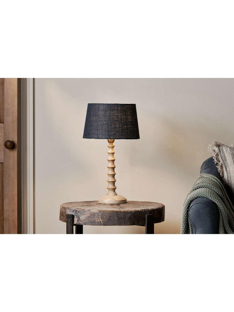 nkuku Avisa mango wood spiral table lamp imported from the UK