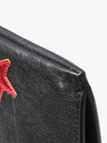 Saint Laurent black star leather clutch bag - British product