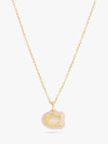 Coach gold pendant necklace with lucite and cubic zirconia, imported from the UK