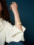 TUTTI textured gold wrap bangle 6.3cm, imported from the UK