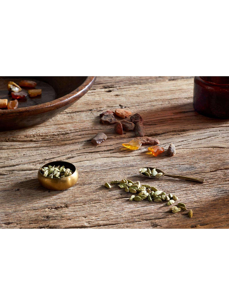 nkuku cardamom and amber scented candle - British product
