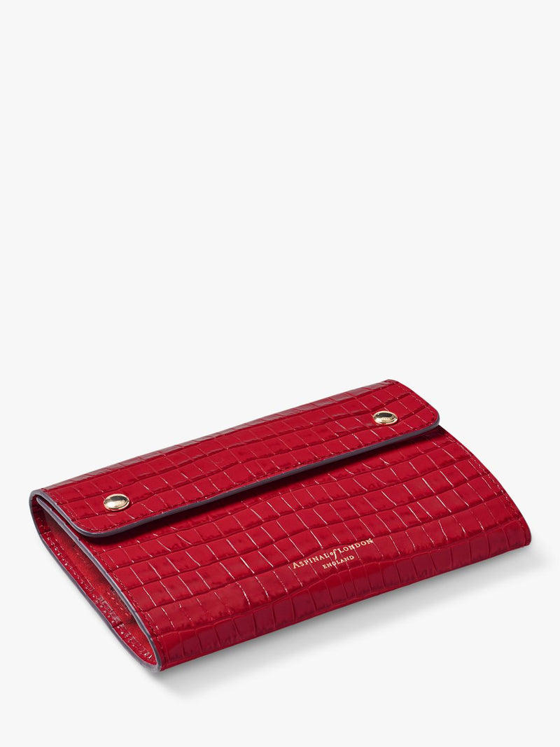 Aspinal of London jewellery roll red, imported from the UK