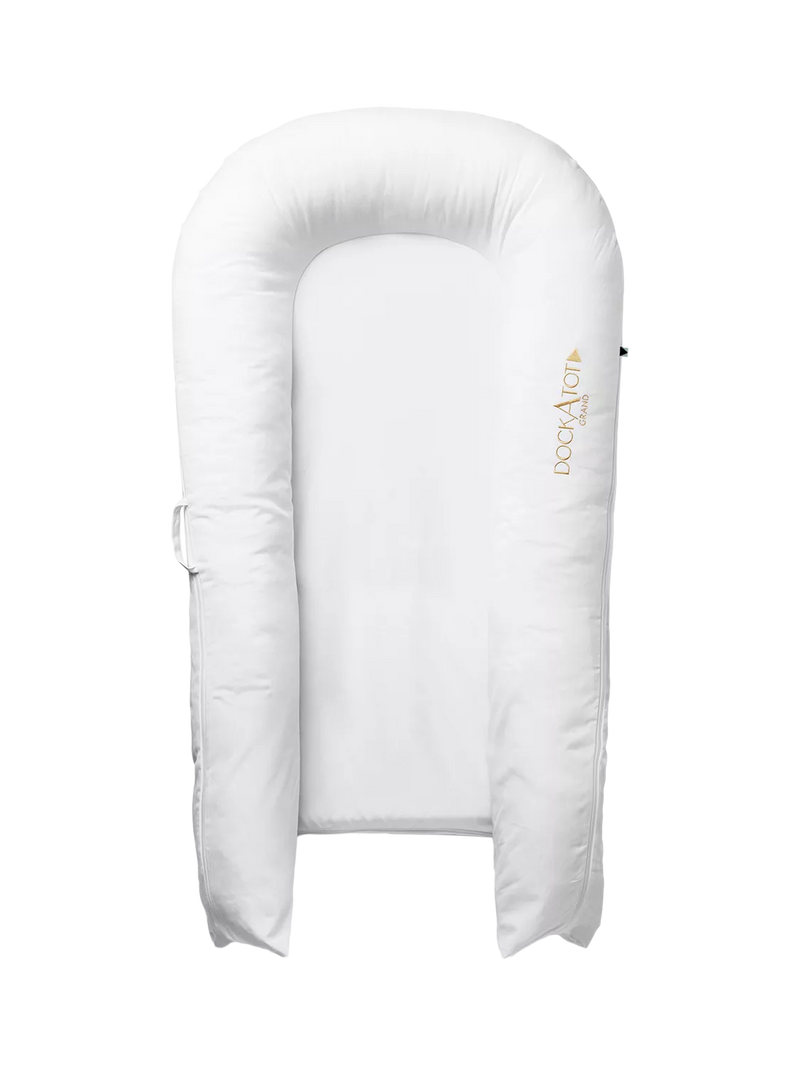 DockATot Grand Toddler Dock white toddler lounger, imported from the UK