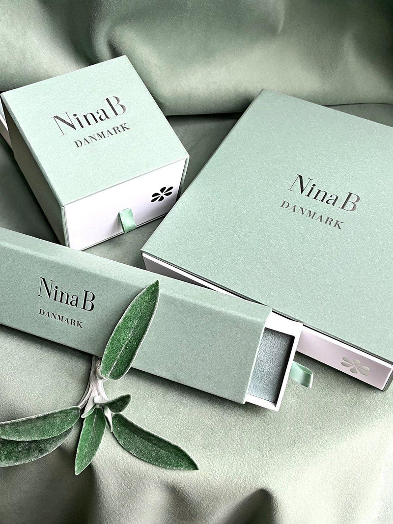 Nina B sterling silver curved oval drop earrings, UK version
