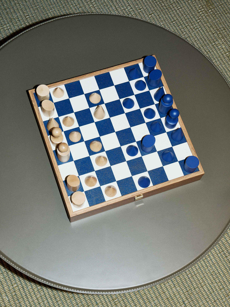 Conran Shop Milos navy wooden chess set, imported from the UK