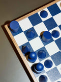 Conran Shop Milos navy wooden chess set, imported from the UK