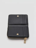 Mango diagonal quilted purse black small, imported from the UK