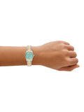 Michael Kors women's Petite Lexington two-tone watch, imported from the UK