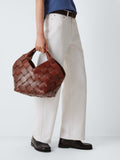 Dragon Diffusion Botteghe woven leather bucket bag, imported from the UK