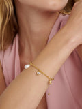 Ted Baker gold tone charm bracelet, imported from the UK
