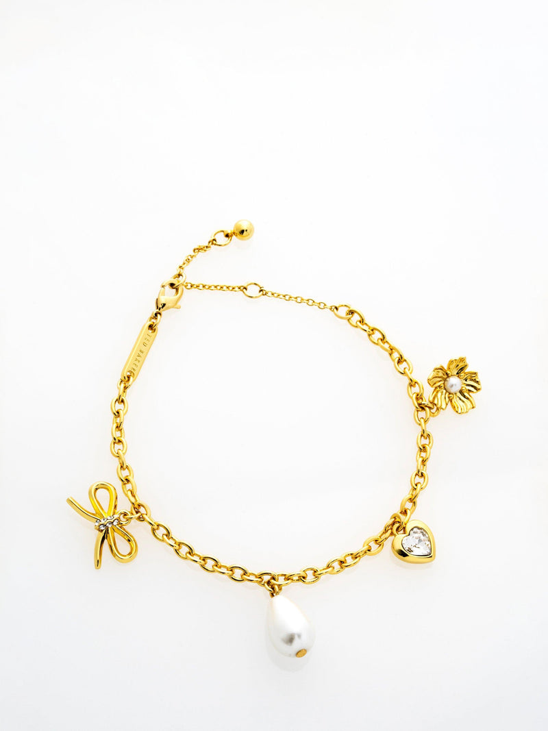 Ted Baker gold tone charm bracelet, imported from the UK