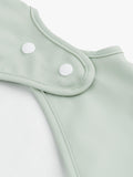Done By Deer sleeved pocket bib Croco (British brand)