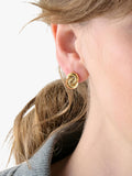 Kate Spade two-tone interlock swirl stud earrings, imported from the UK