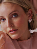 Daisy London mini knot stud earrings in silver (British brand)
