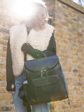 Storksak vegan leather convertible changing backpack in black (British brand)