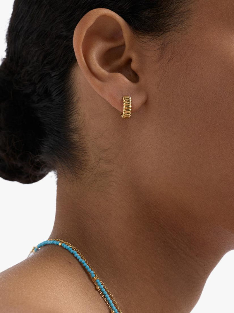 Astley Clarke gold huggie hoop earrings, UK version