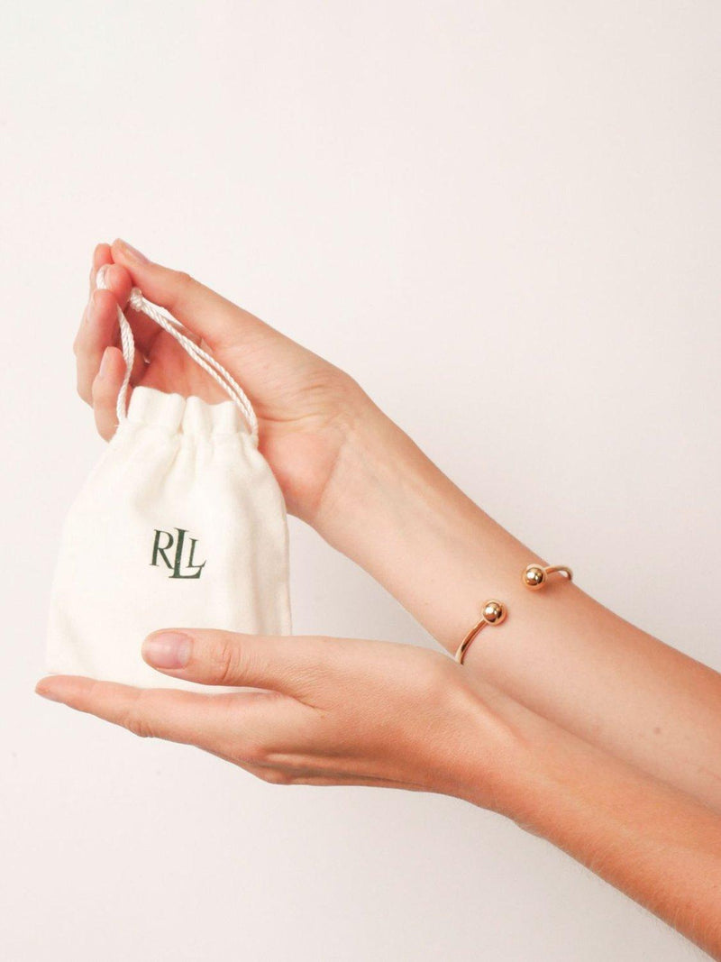 Lauren Ralph Lauren gold bangle, imported from the UK