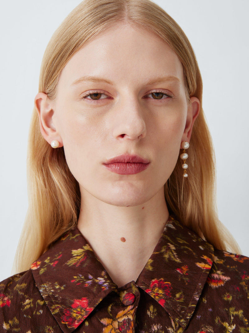 Completedworks mismatch freshwater pearl earrings in gold, imported from the UK