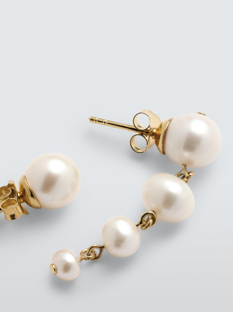 Completedworks mismatch freshwater pearl earrings in gold, imported from the UK