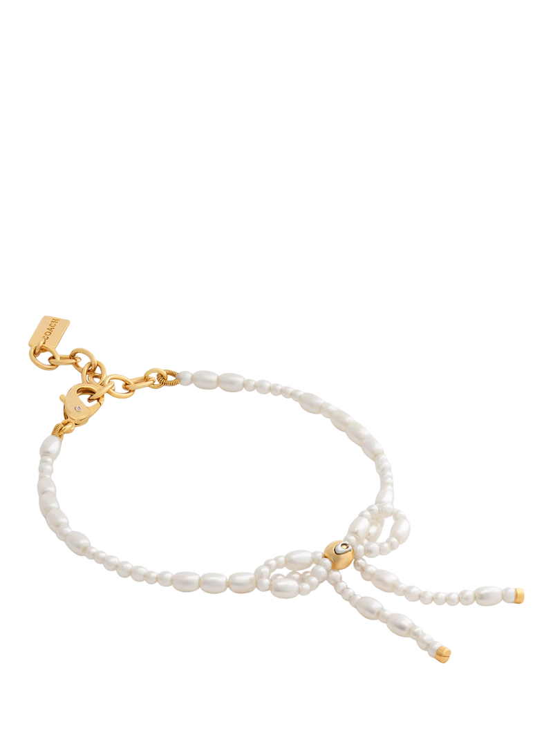 Coach pearl bow bracelet with gold tone accents, UK version
