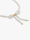Coach pearl bow bracelet with gold tone accents, UK version