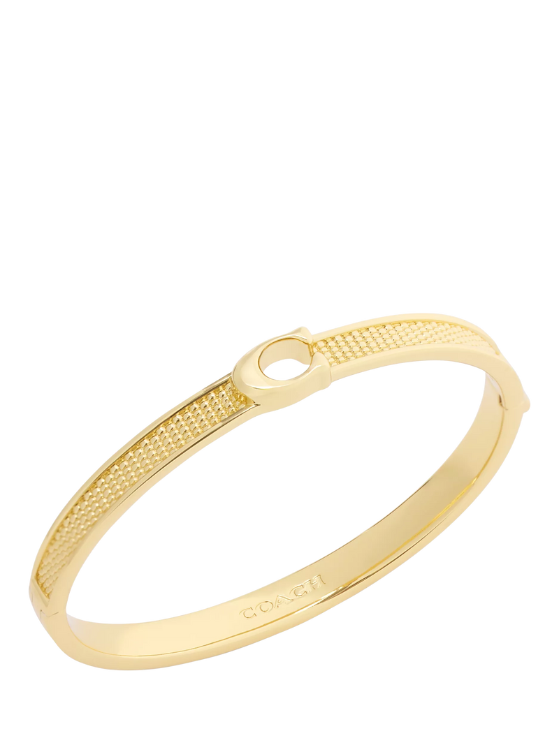 Coach gold toned textured bangle bracelet with C motif, UK version