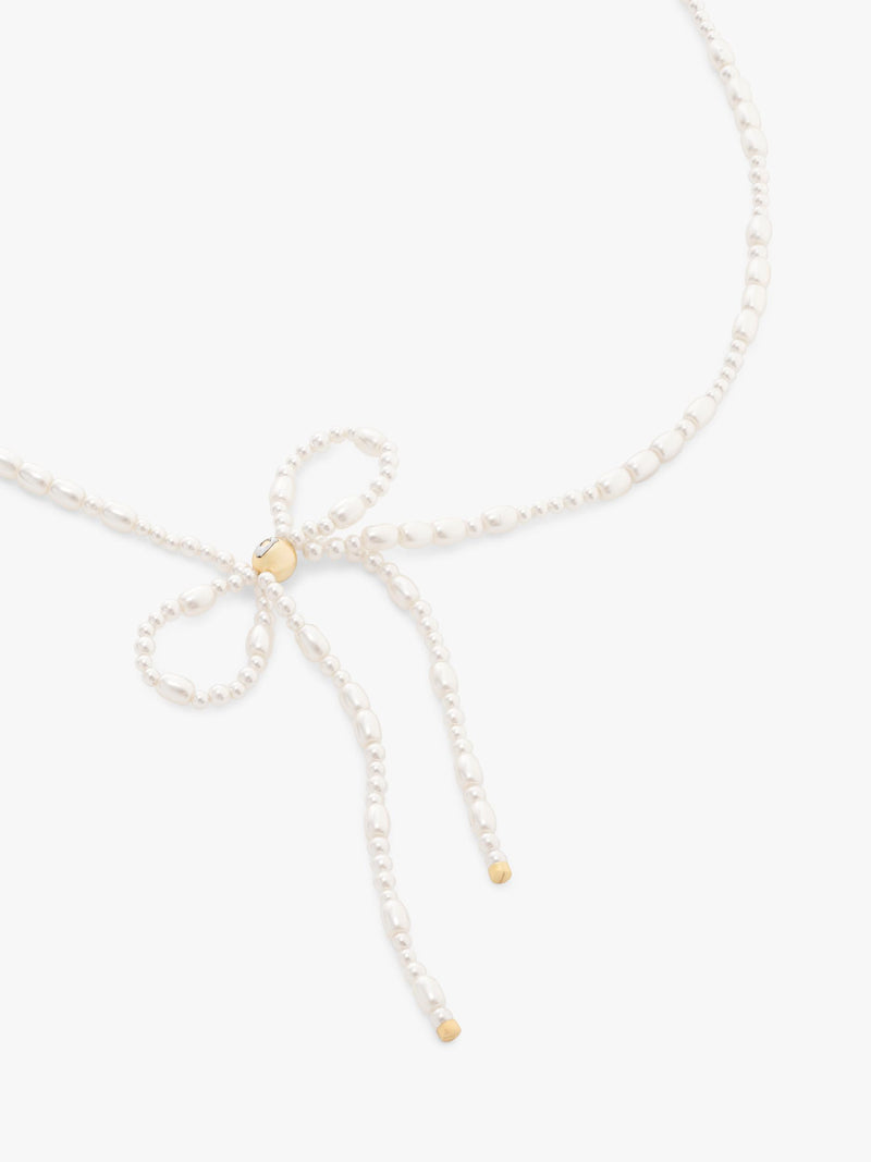 Coach pearl bow choker necklace, imported from the UK