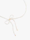 Coach pearl bow choker necklace, imported from the UK