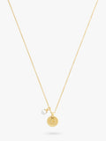 Coach gold-toned disc pendant necklace imported from the UK