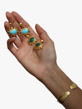 Ottoman Hands Zand drop earrings gold and emerald, UK version