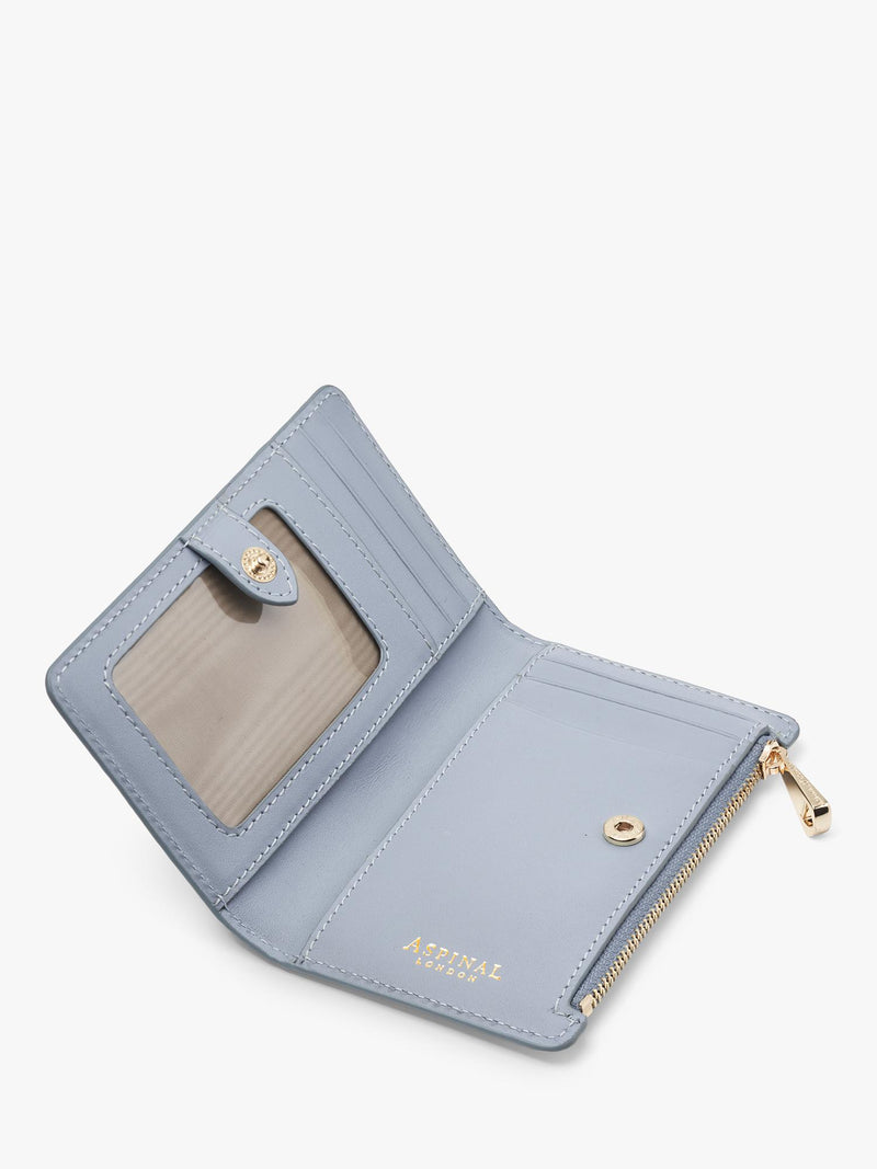 Aspinal of London Mayfair croc-effect leather purse in skyblue - British product