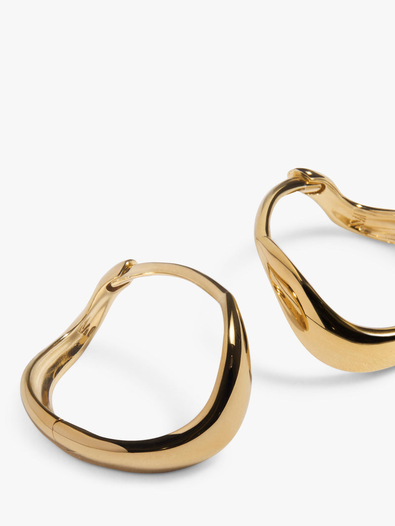 Monica Vinader Swirl Huggie Earrings, imported from the UK