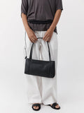 St. Agni minimal black leather pocket bag, UK version