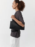 St. Agni minimal black leather pocket bag, UK version