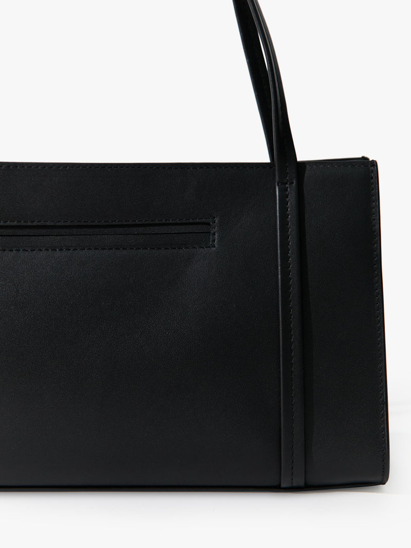 St. Agni minimal black leather pocket bag, UK version