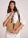 Mint Velvet woven bucket bag in Natural, imported from the UK