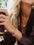 Missoma beaded pearl bracelet in gold and white (British brand)