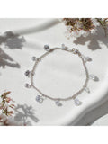 IBB sterling silver cubic zirconia drop charm bracelet, imported from the UK