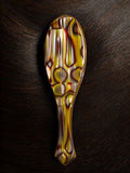 Oribe flat hair brush with Italian resin handle, imported from the UK